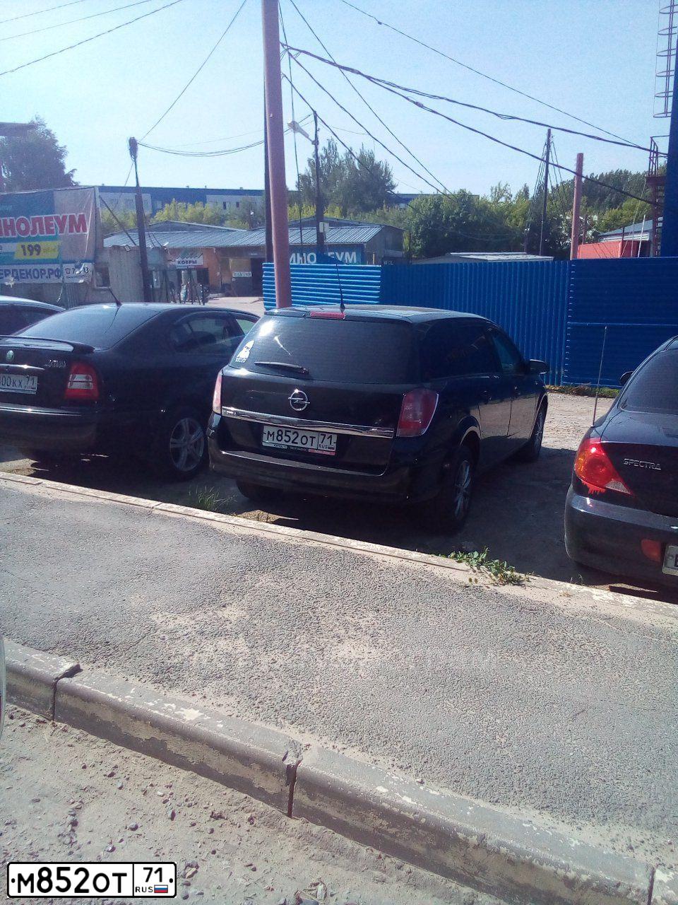 Фото автомобиля OPEL ASTRA, 2007 — госномер М852ОТ71. Цвет: ЧЕРНЫЙ