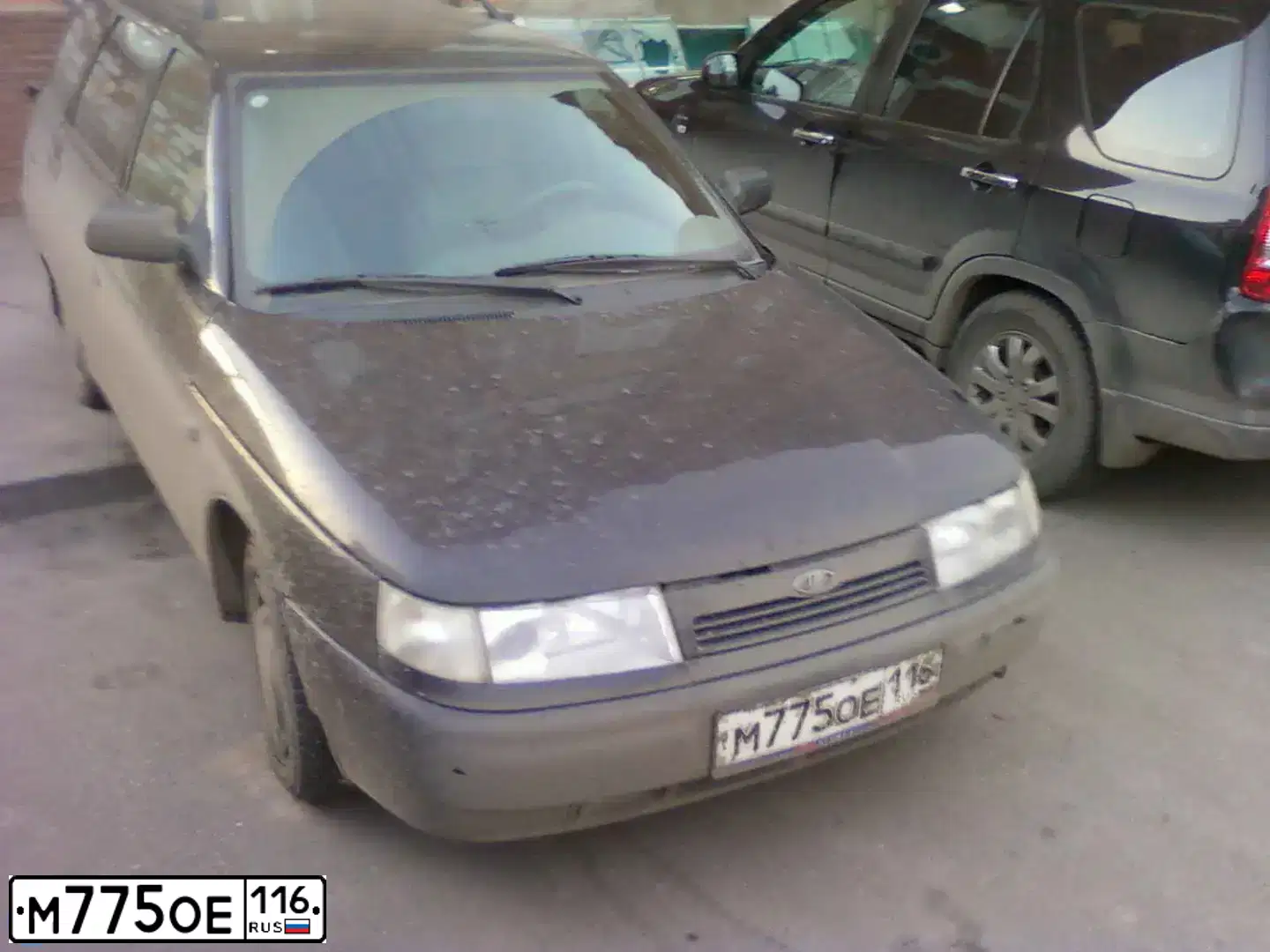 Фото автомобиля LADA 2111, 2009 — госномер В754РС126. Цвет: Сине-Черный