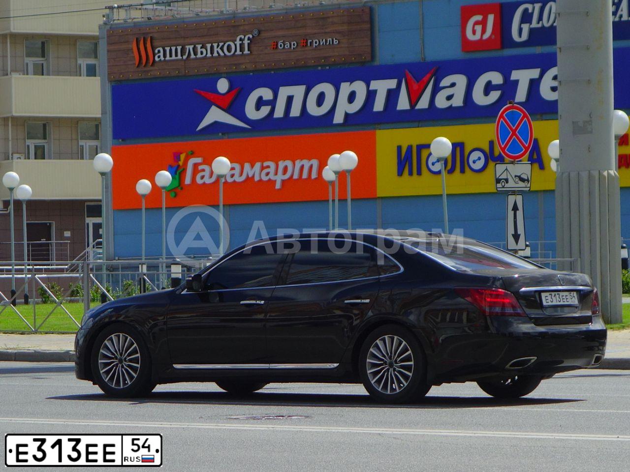 Фото автомобиля INFINITI QX70 /FX/, 2009 — госномер А050ХМ154. Цвет: Коричневый