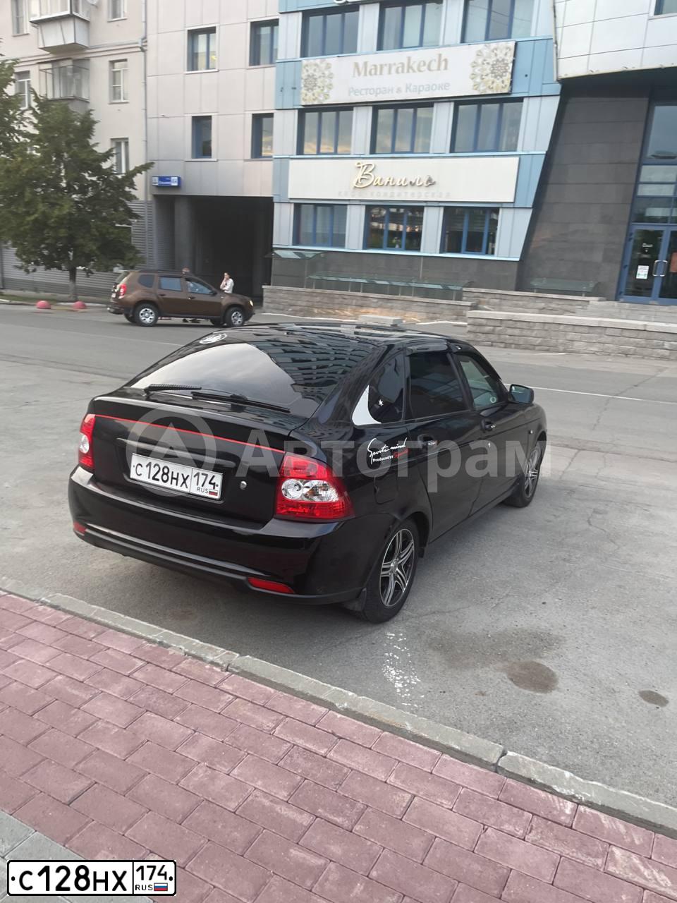 Фото автомобиля LADA 2172 PRIORA, 2011 — госномер С128НХ174. Цвет: ЧЕРНЫЙ