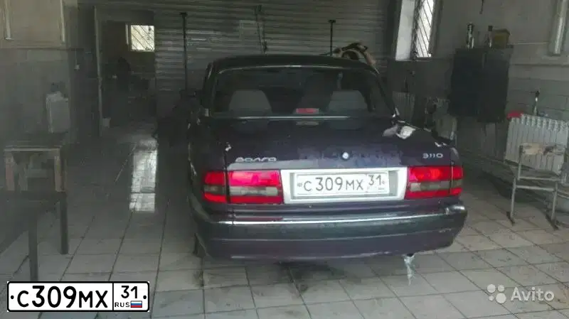 Фото автомобиля GAZ 3110 WOLGA, 2001 — госномер С309МХ31. Цвет: БАКЛАЖАН