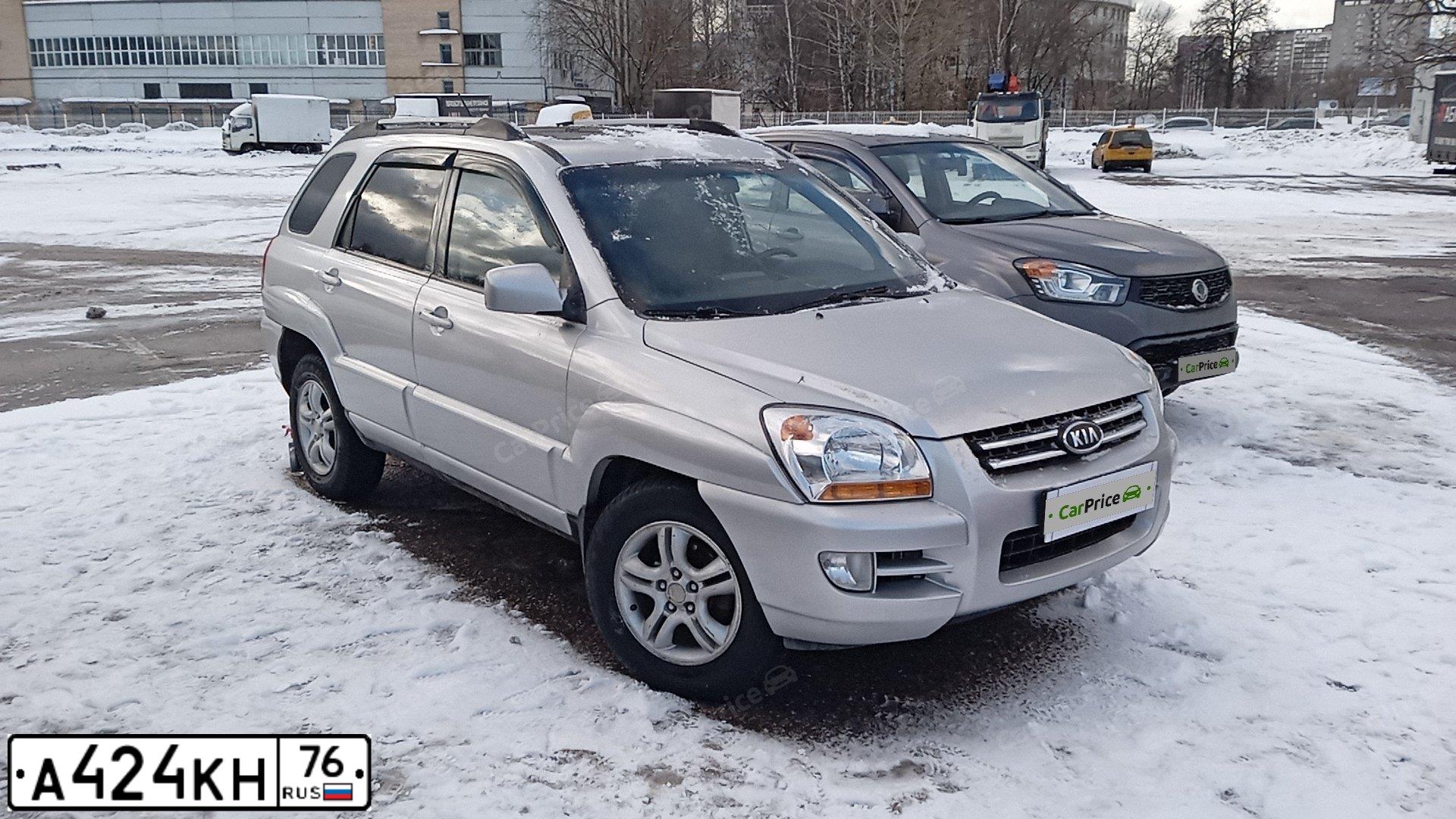 Фото автомобиля KIA SPORTAGE, 2005 — госномер А424КН76. Цвет: СЕРЫЙ