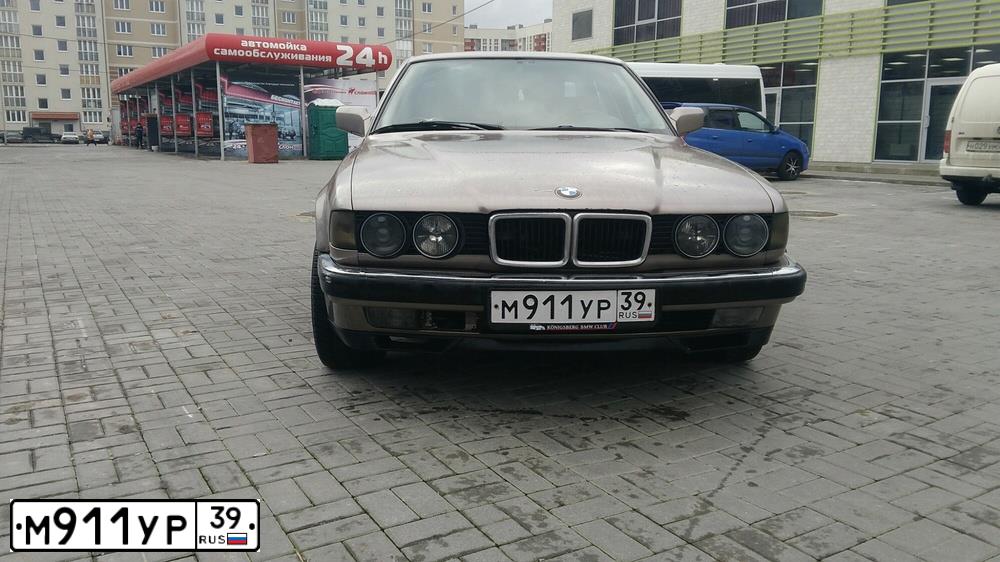 Фото автомобиля BMW W SERIE 7, 1989 — госномер М911УР39. Цвет: КОРИЧНЕВЫЙ