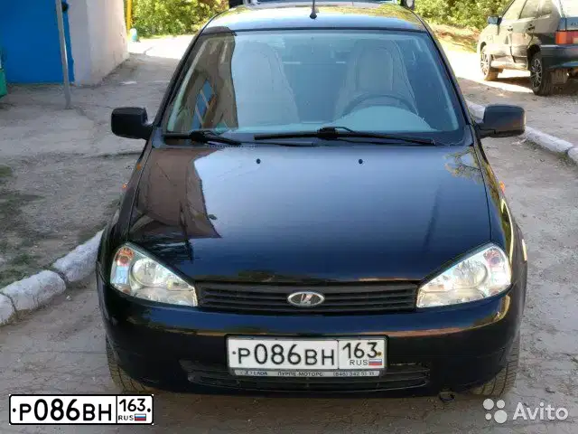 Фото автомобиля LADA 1117 KALINA, 2012 — госномер Р677ОР58. Цвет: Сине-Черный