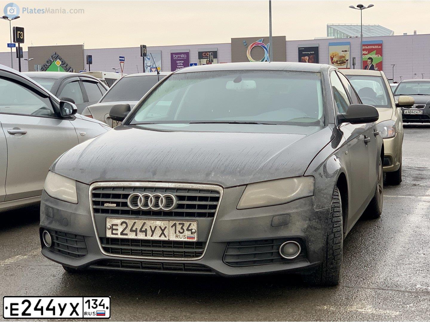 Фото автомобиля AUDI A4, 2010 — госномер М413УУ21. Цвет: СЕРО-ЧЕРНЫЙ