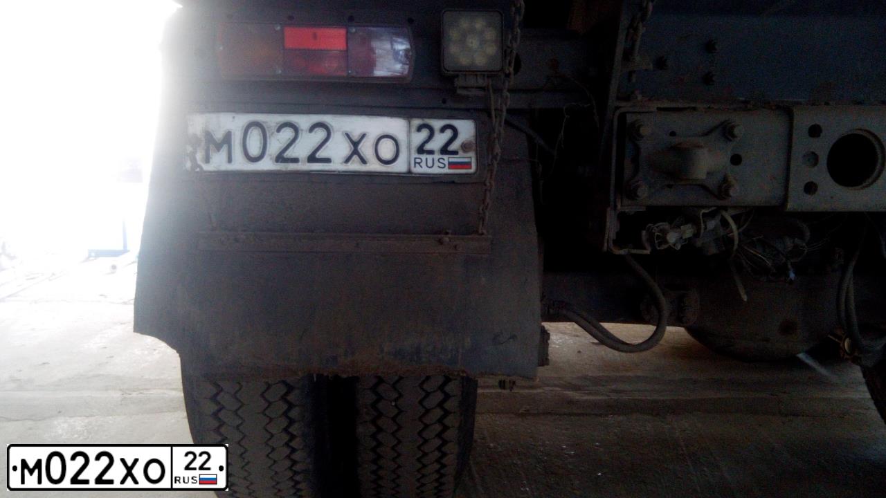 Фото автомобиля KAMAZ 65115 /6X4/, 2007 — госномер М022ХО22. Цвет: ОРАНЖЕВЫЙ