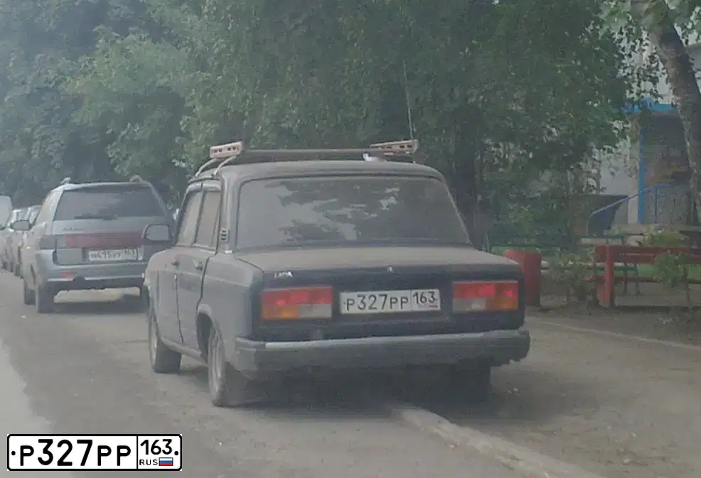 Фото автомобиля LADA 2107, 1991 — госномер Р327РР163. Цвет: ТЕМНО-СИНИЙ