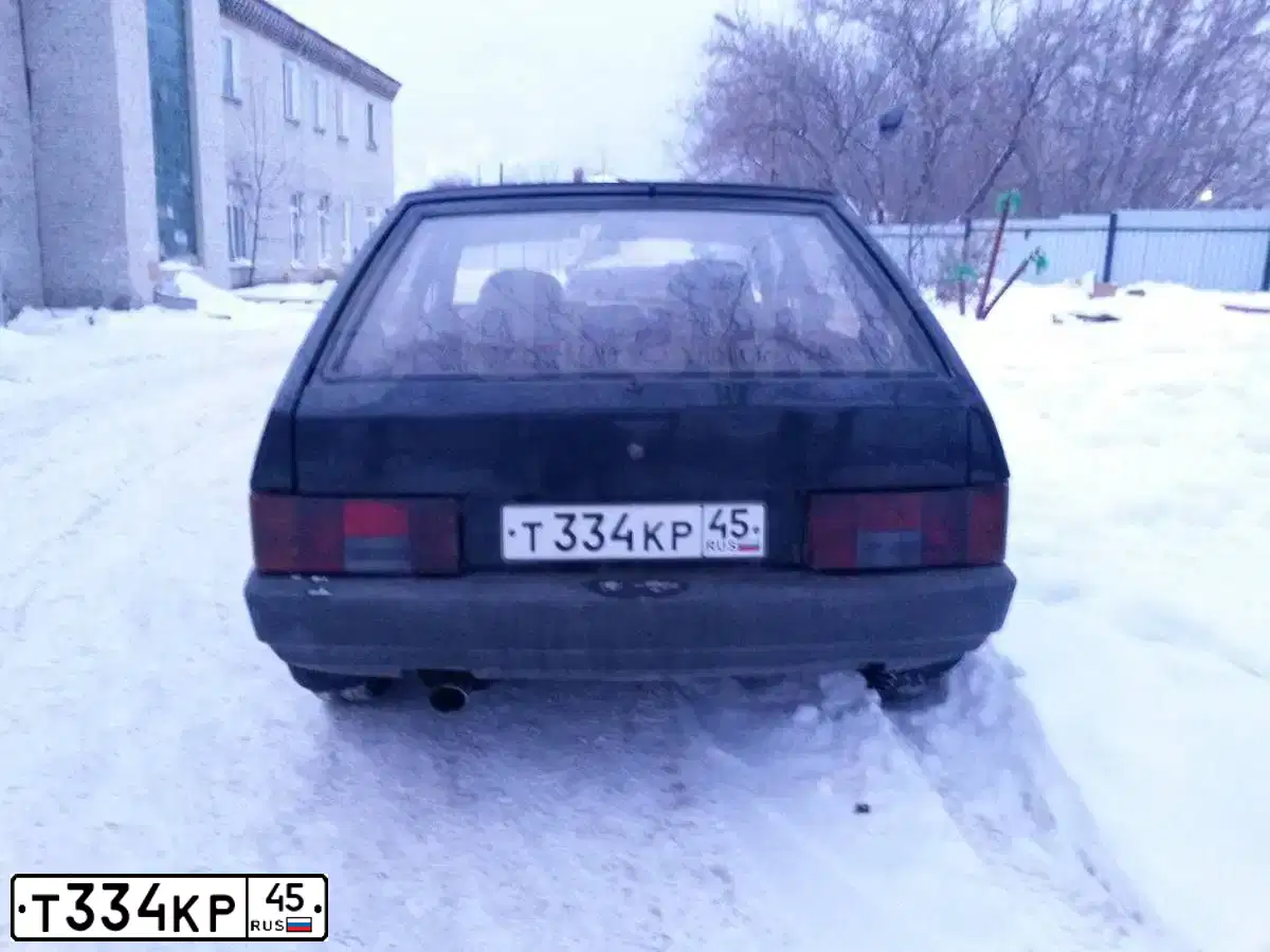 Фото автомобиля LADA 2109 SAMARA, 1997 — госномер Т334КР45. Цвет: ЧЕРНЫЙ