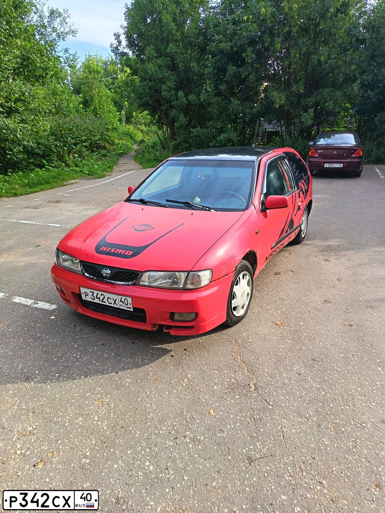 Фото автомобиля NISSAN ALMERA, 1998 — госномер Р342СХ40. Цвет: Красный