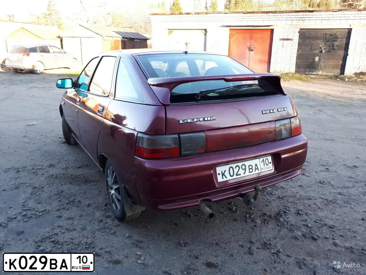 Фото автомобиля LADA 2112, 2005 — госномер Н884АМ10. Цвет: ТЕМНО-МАЛИНОВЫЙ