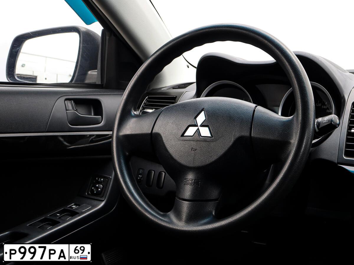 Фото автомобиля MITSUBISHI LANCER, 2010 — госномер Х200МР76. Цвет: СЕРЫЙ