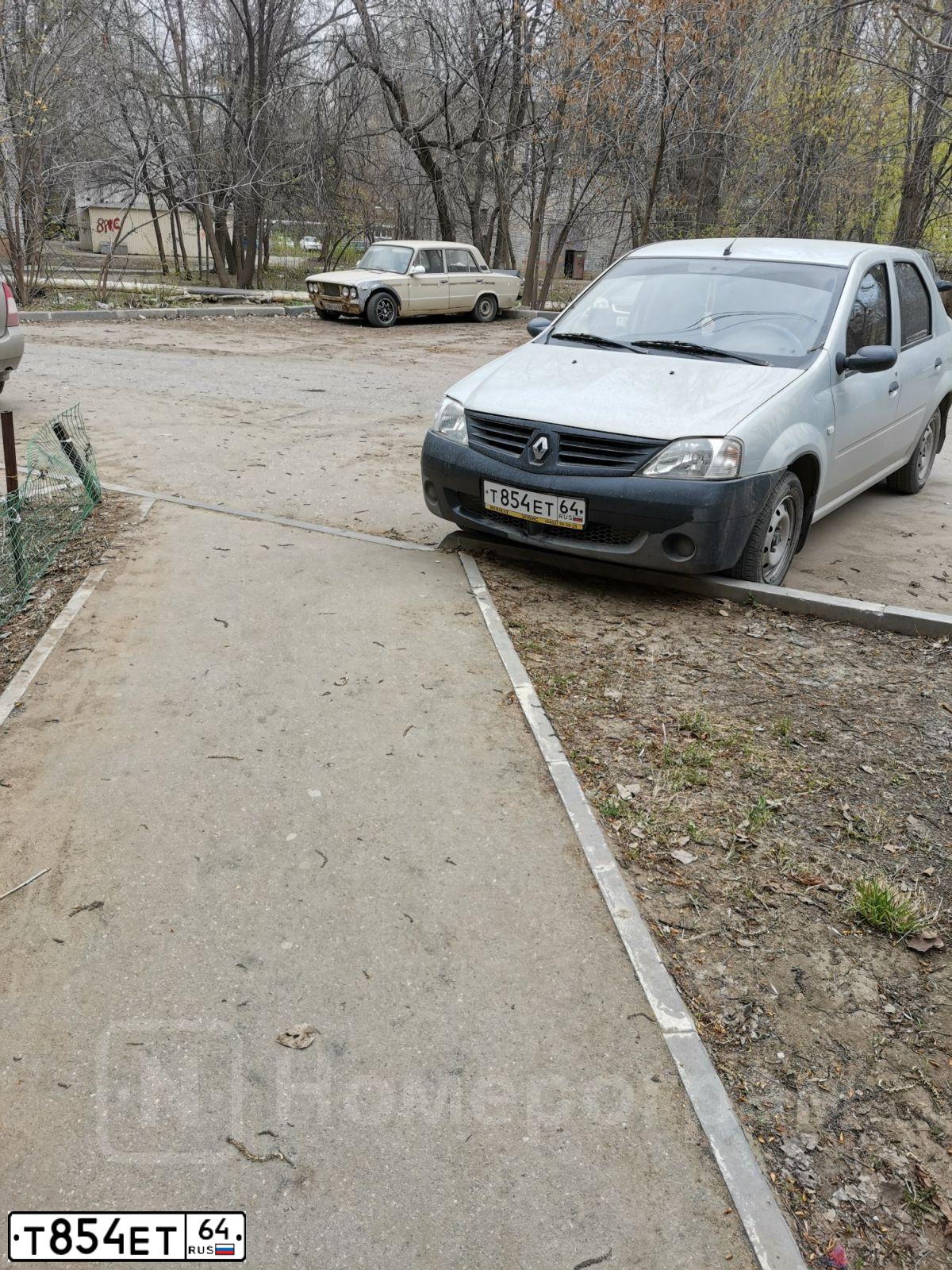 Фото автомобиля RENAULT LOGAN, 2006 — госномер Т854ЕТ64. Цвет: СЕРЫЙ