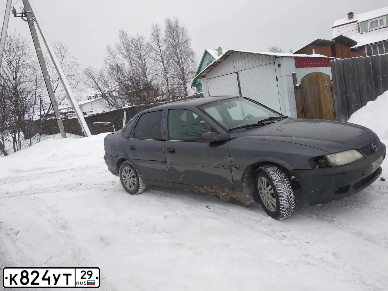 Фото автомобиля OPEL VECTRA, 1996 — госномер К824УТ29. Цвет: ФИОЛЕТОВЫЙ