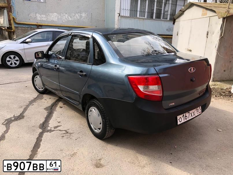 Фото автомобиля KIA SPECTRA, 2006 — госномер В907ВВ61. Цвет: КРАСНЫЙ ПЕРЕЦ