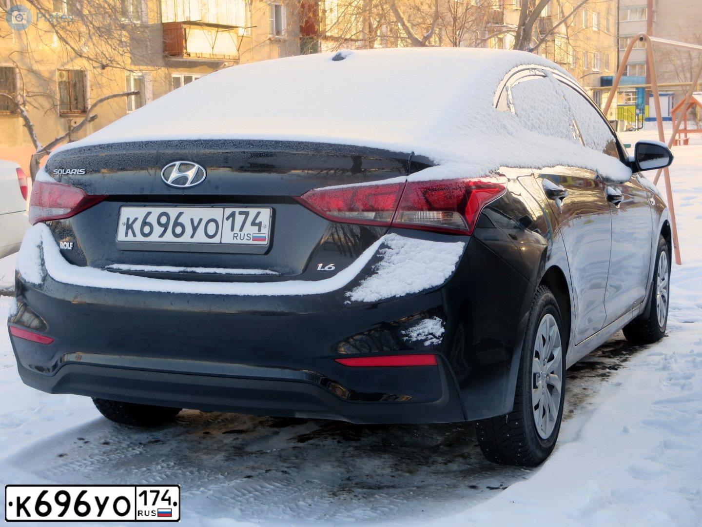 Фото автомобиля HYUNDAI SOLARIS, 2019 — госномер К696УО174. Цвет: ЧЕРНЫЙ