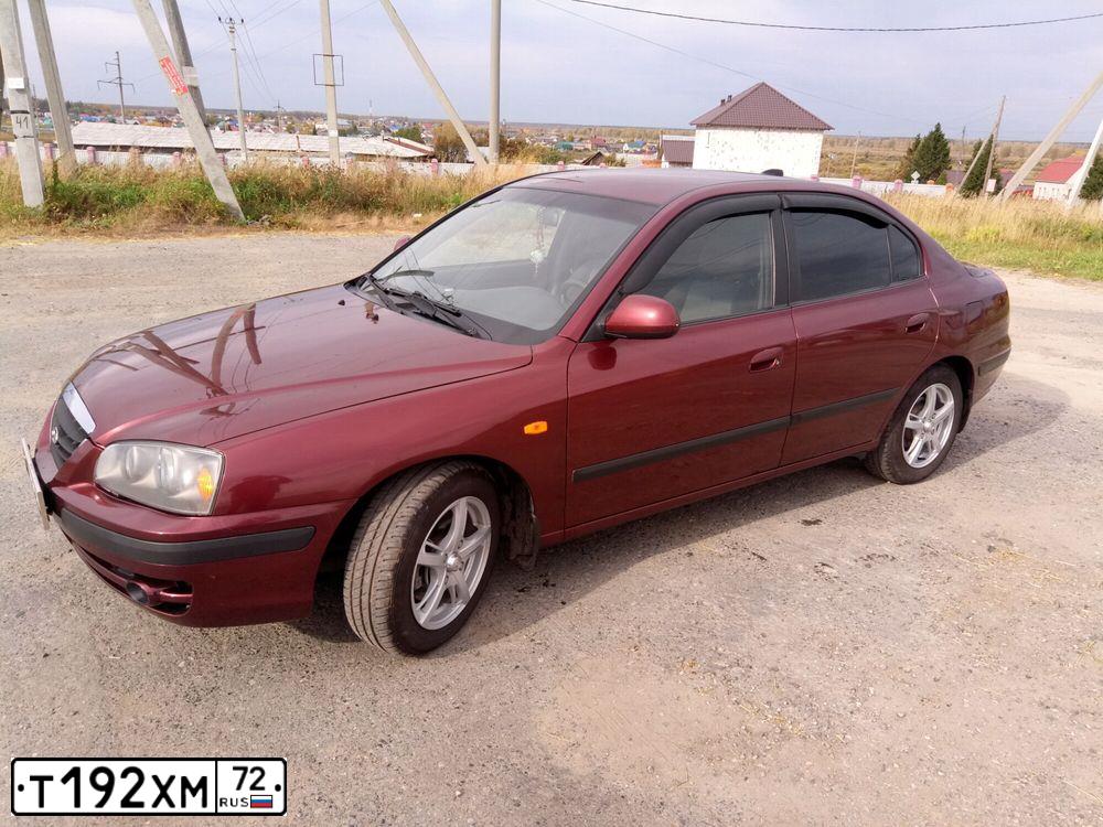 Фото автомобиля TAGAZ ELANTRA XD, 2008 — госномер Т192ХМ72. Цвет: Красный