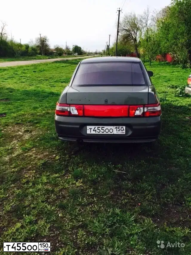 Фото автомобиля LADA 2110, 1998 — госномер Т455ОО150. Цвет: СЕРЕБРИСТЫЙ ТЕМНО-ЗЕЛЕНЫЙ