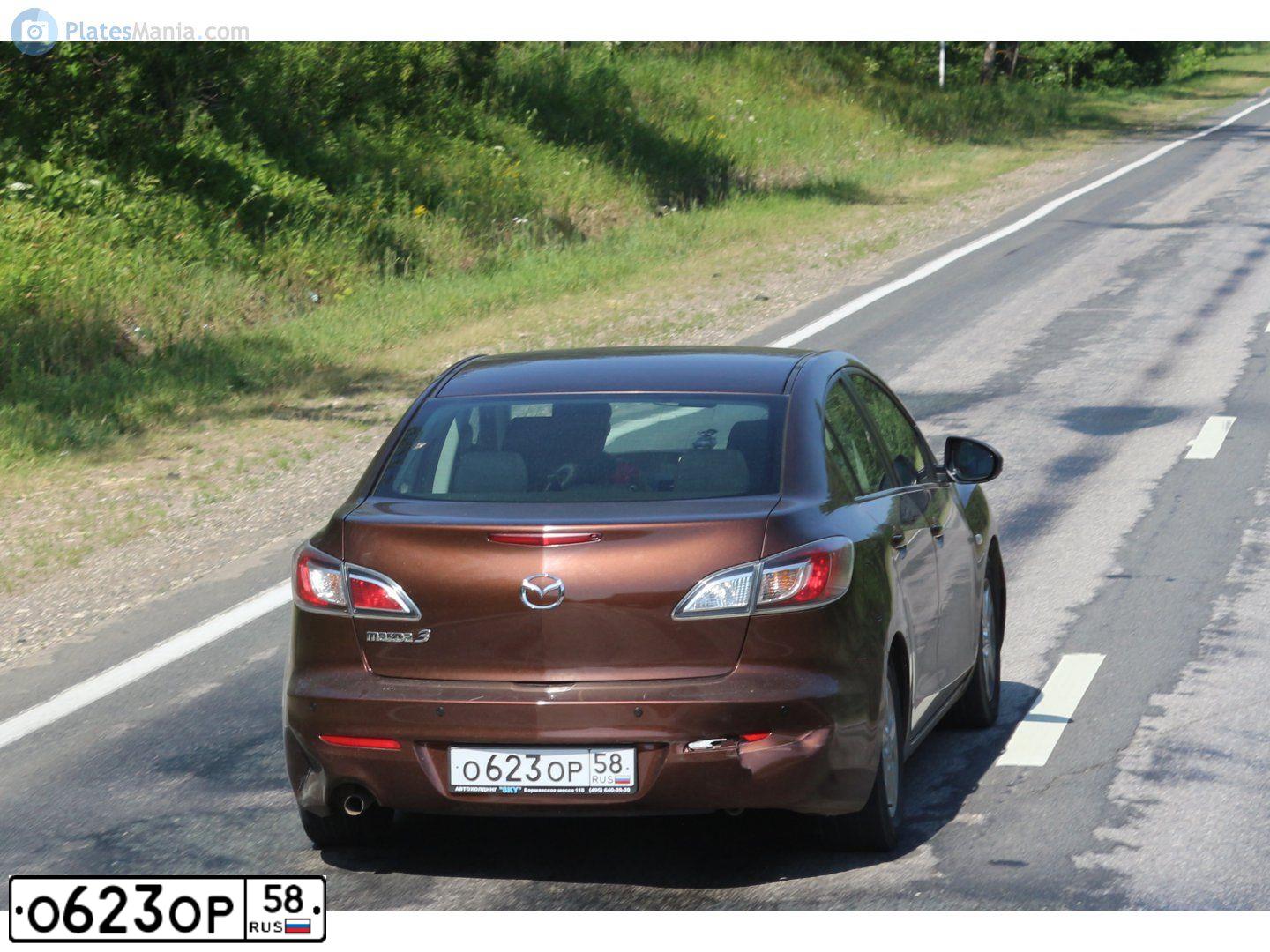 Фото автомобиля MAZDA 3, 2012 — госномер О623ОР58. Цвет: КОРИЧНЕВЫЙ