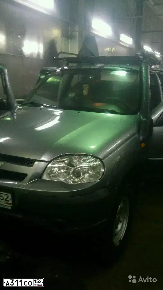 Фото автомобиля CHEVROLET NIVA, 2010 — госномер А311СО152. Цвет: ТЕМНО-СЕРЫЙ
