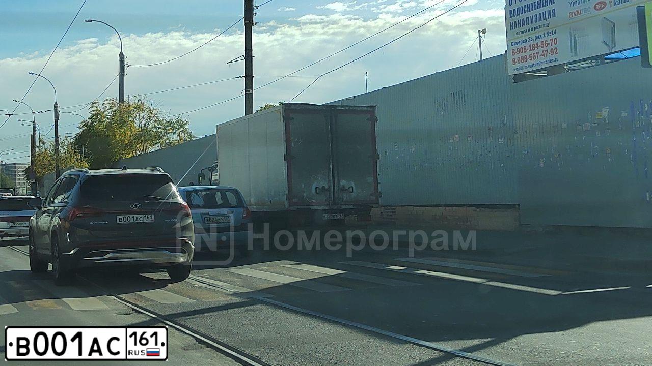 Фото автомобиля VOLKSWAGEN PASSAT, 2007 — госномер В001АС161. Цвет: ЧЕРНЫЙ