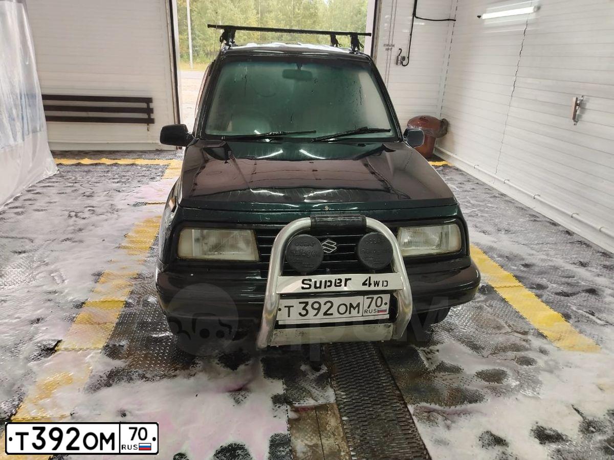 Фото автомобиля СУЗУКИ ЭСКУДО СУЗУКИ ЭСКУДО, 1993 — госномер Т392ОМ70. Цвет: Зеленый