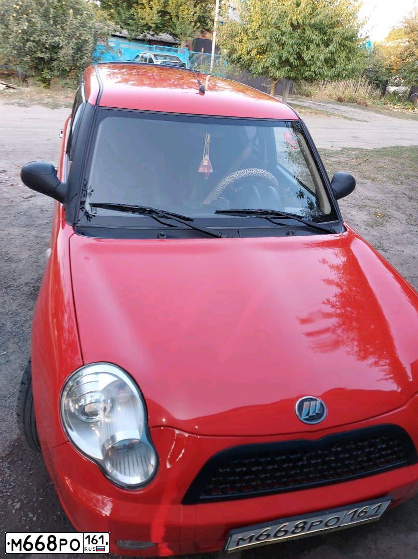 Фото автомобиля LIFAN SMILY, 2012 — госномер М653КЕ181. Цвет: Красный