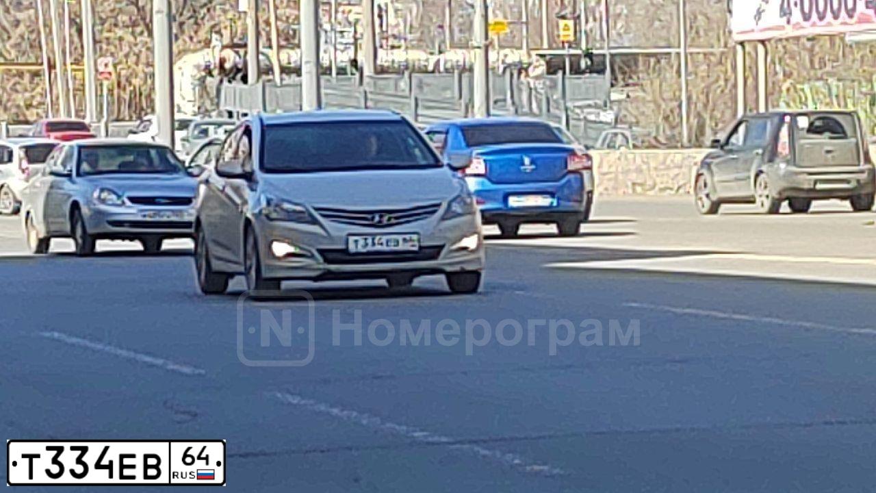 Фото автомобиля HYUNDAI SOLARIS, 2014 — госномер Т334ЕВ64. Цвет: БЕЖЕВЫЙ