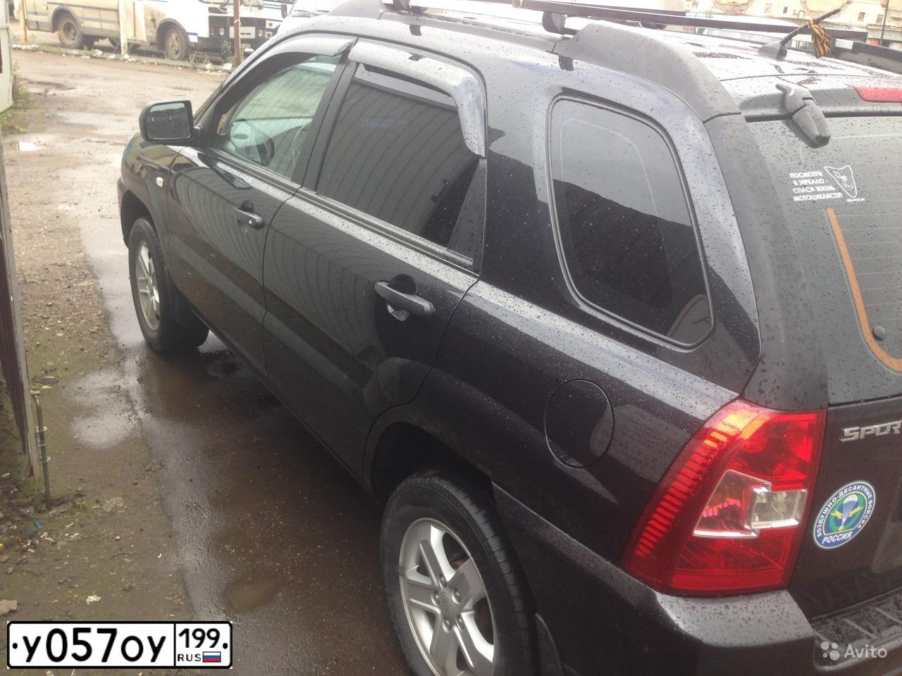 Фото автомобиля KIA SPORTAGE, 2008 — госномер У057ОУ199. Цвет: ЧЕРНЫЙ
