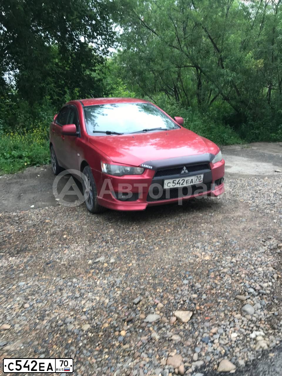 Фото автомобиля MITSUBISHI LANCER, 2011 — госномер У428КЕ797. Цвет: СЕРЫЙ