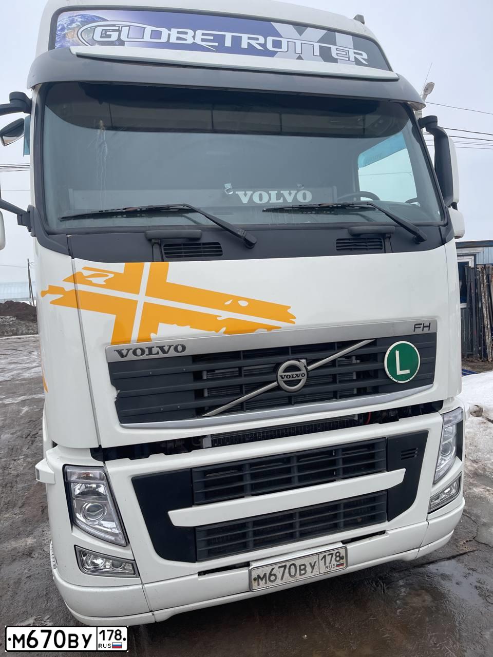 Фото автомобиля VOLVO SERIE FH /4X2/, 2009 — госномер М604НМ198. Цвет: Белый