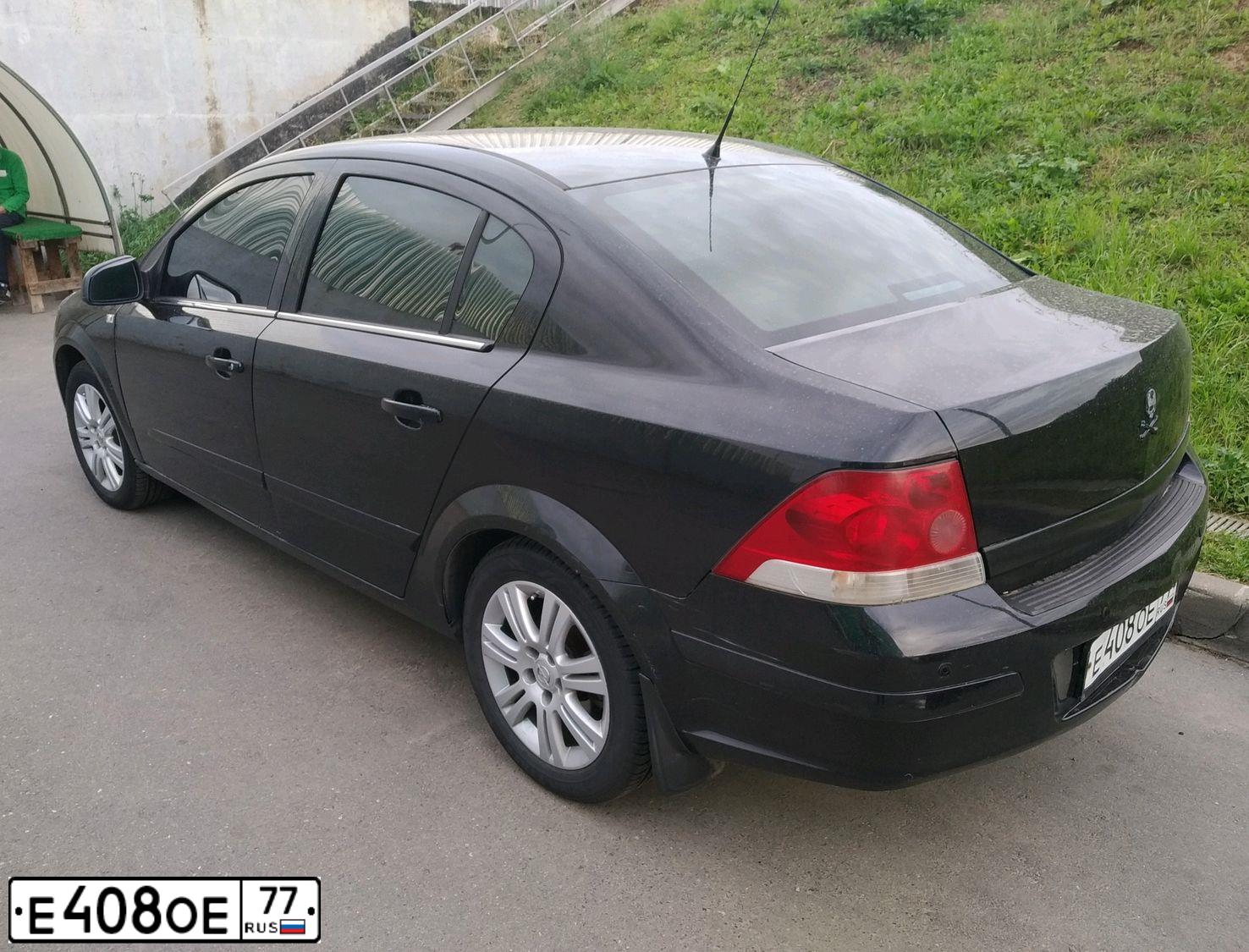 Фото автомобиля OPEL ASTRA, 2009 — госномер О124КВ32. Цвет: ЧЕРНЫЙ
