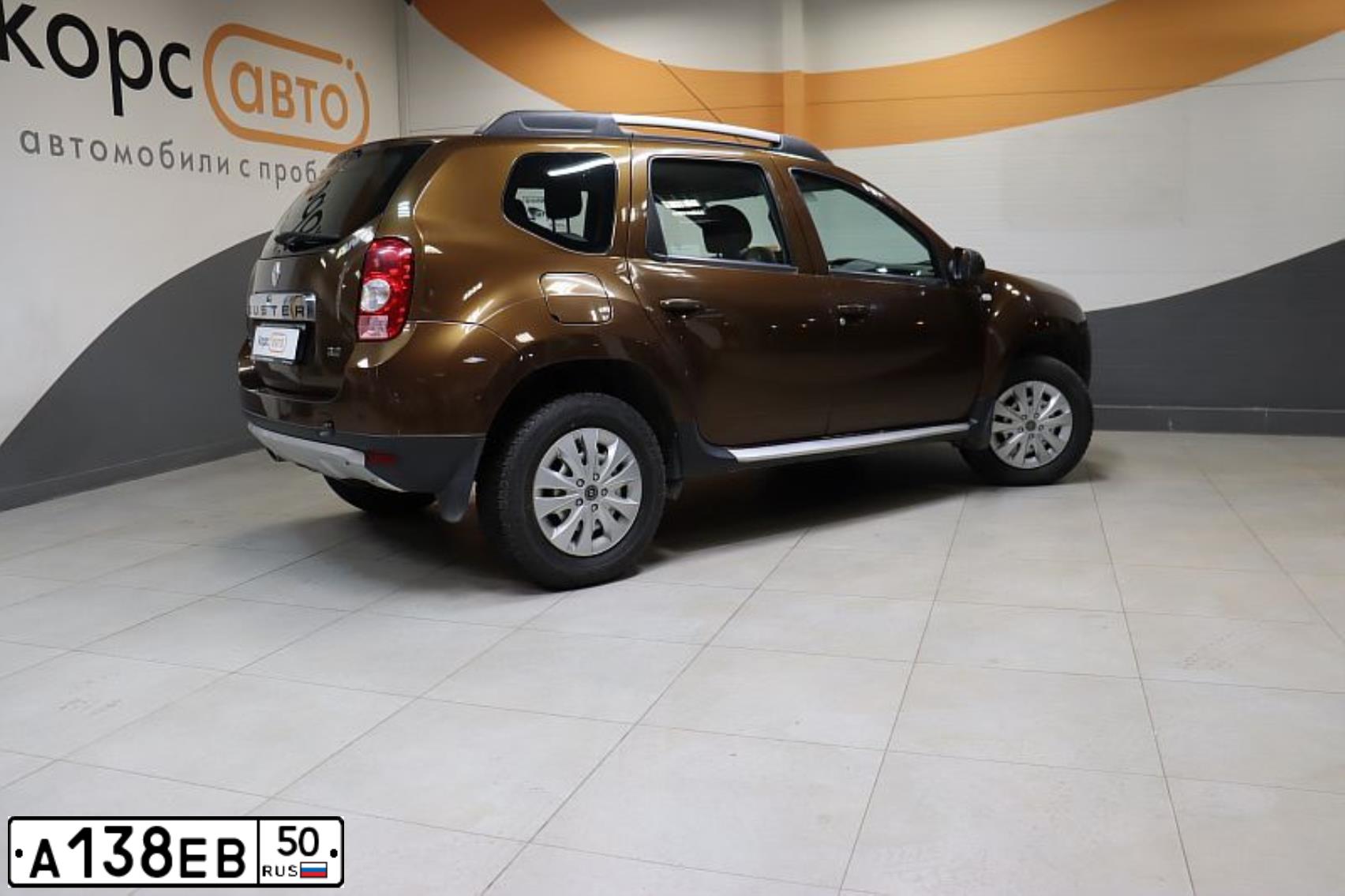 Фото автомобиля RENAULT DUSTER, 2013 — госномер Р925ВТ40. Цвет: Коричневый