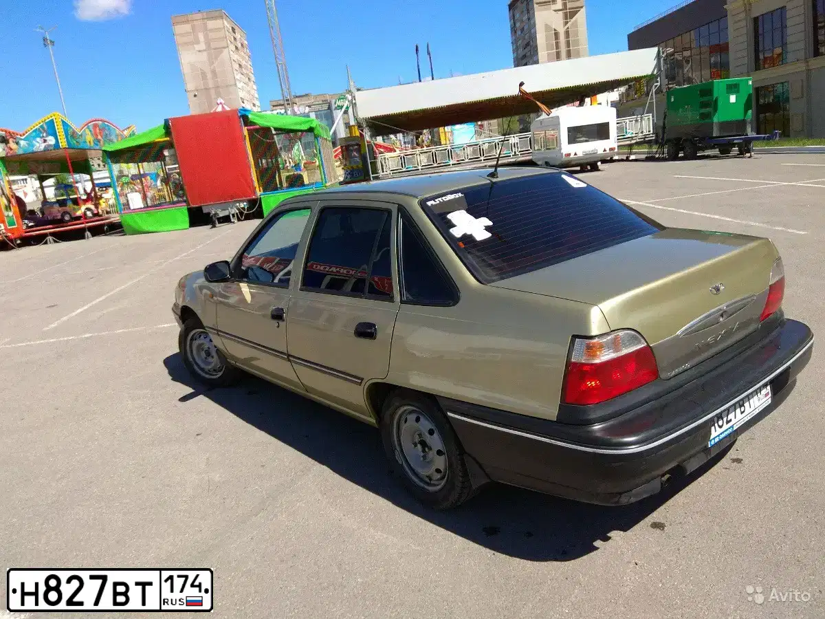 Фото автомобиля DAEWOO NEXIA, 2008 — госномер Н827ВТ174. Цвет: ПЕСОЧНО-БЕЖЕВЫЙ
