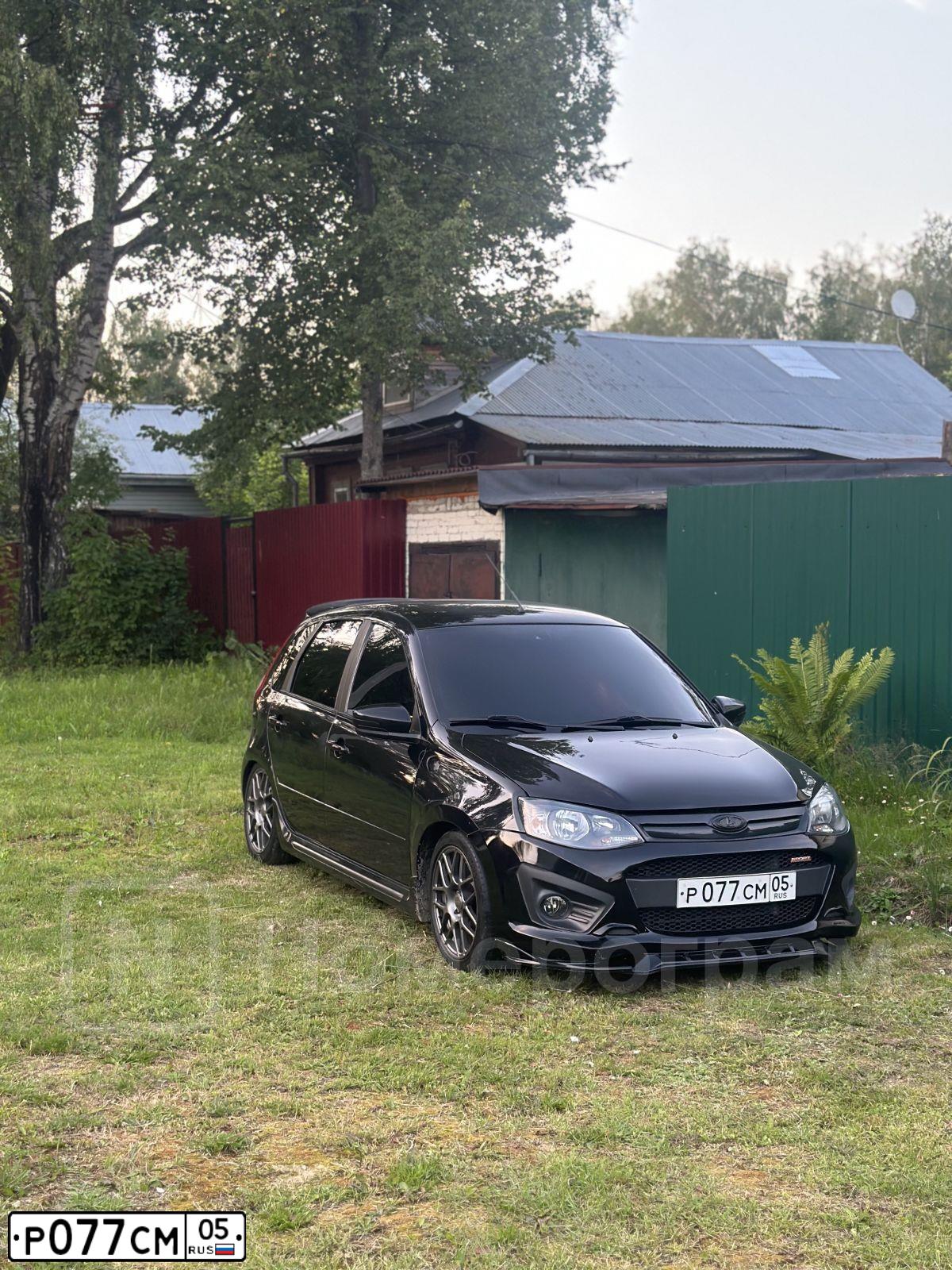 Фото автомобиля LADA 2192 KALINA, 2015 — госномер Р077СМ05. Цвет: ЧЕРНЫЙ