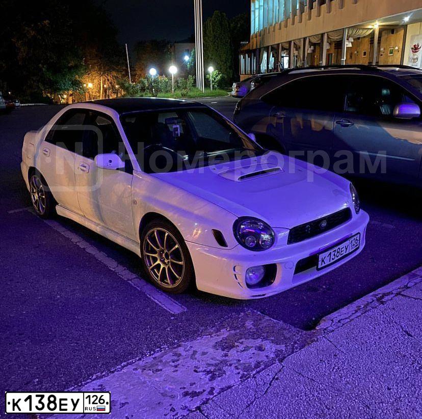 Фото автомобиля SUBARU IMPREZA, 2002 — госномер С965ТС123. Цвет: Белый