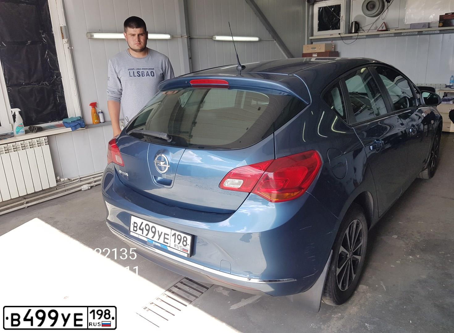 Фото автомобиля OPEL ASTRA, 2013 — госномер Р033АМ32. Цвет: СИНИЙ МЕТАЛЛИК