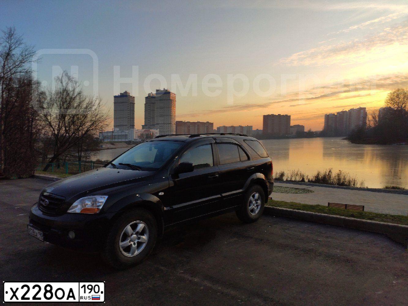 Фото автомобиля KIA SORENTO, 2007 — госномер Х228ОА190. Цвет: ЧЕРНЫЙ