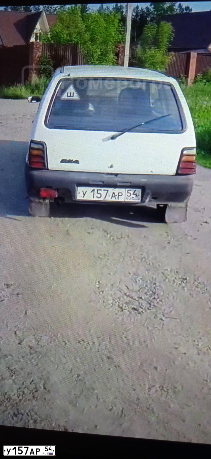Фото автомобиля SEAZ OKA, 2001 — госномер У157АР54. Цвет: Белый