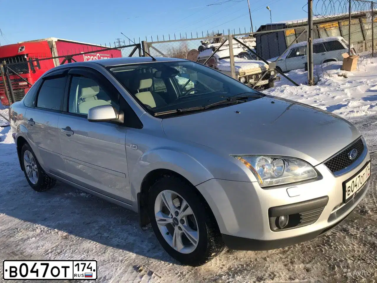 Фото автомобиля FORD FOCUS, 2011 — госномер Т776ТО174. Цвет: СЕРО-КОРИЧНЕВЫЙ