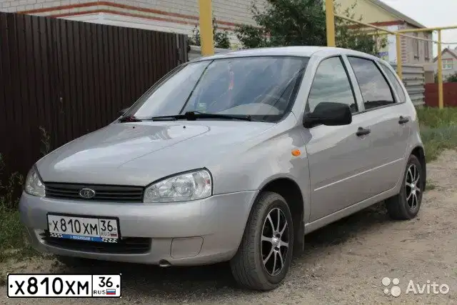 Фото автомобиля LADA 1119 KALINA, 2011 — госномер О957МВ36. Цвет: серебристый