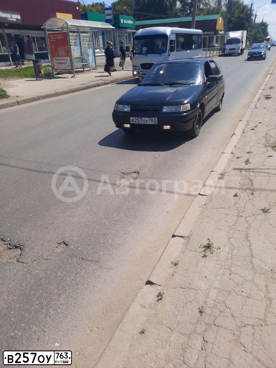 Фото автомобиля LADA 2112 LADA, 2004 — госномер В257ОУ763. Цвет: ГРАФИТОВЫЙ МЕТАЛЛИК