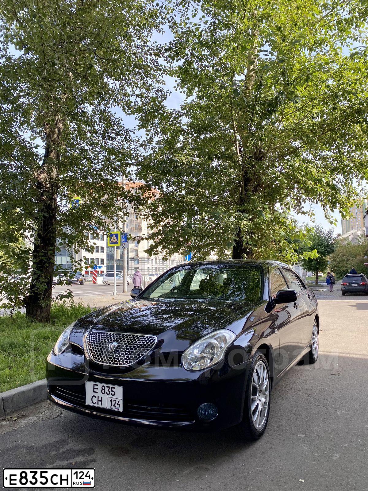 Фото автомобиля LADA 1118 KALINA, 2006 — госномер Н323ОУ124. Цвет: СЕРЕБРИСТО-КРАСНЫЙ