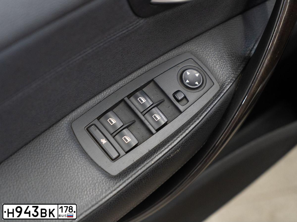 Фото автомобиля BMW X3, 2008 — госномер Т124КВ198. Цвет: ЧЕРНЫЙ