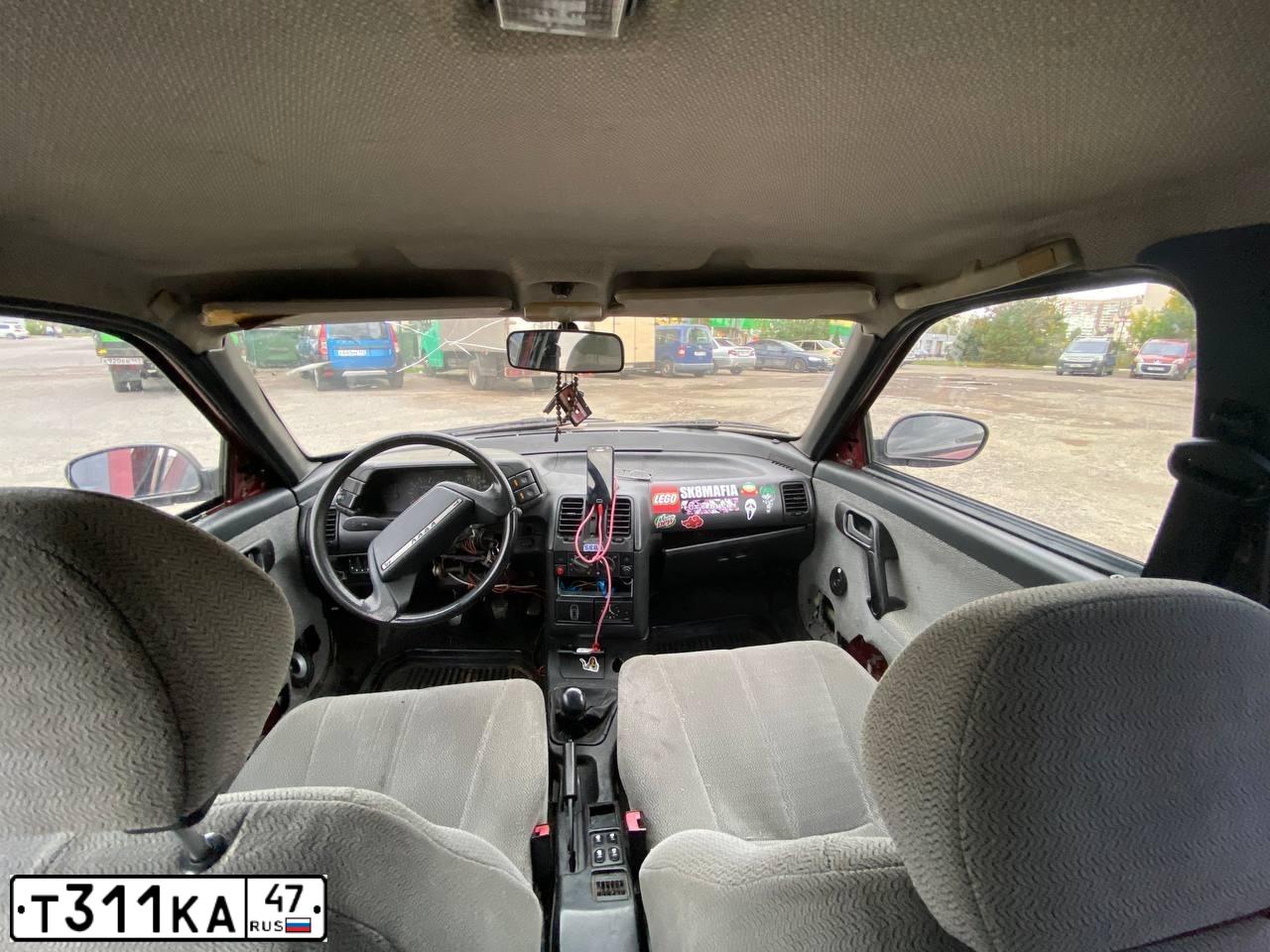 Фото автомобиля LADA 2112 LADA, 2000 — госномер Т311КА47. Цвет: СЕРЕБРИСТЫЙ КРАСНЫЙ