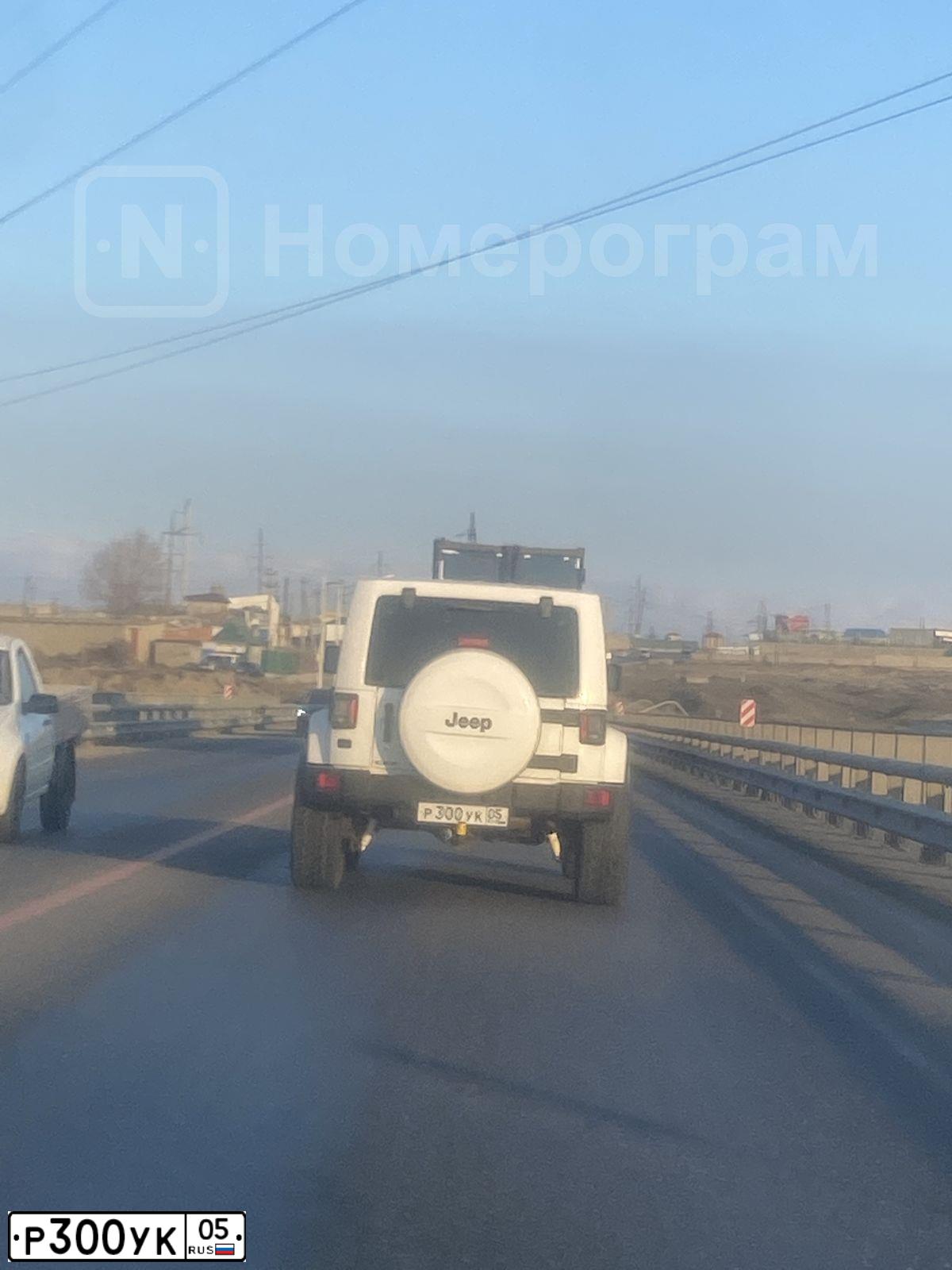 Фото автомобиля JEEP WRANGLER, 2014 — госномер К910КК31. Цвет: Белый