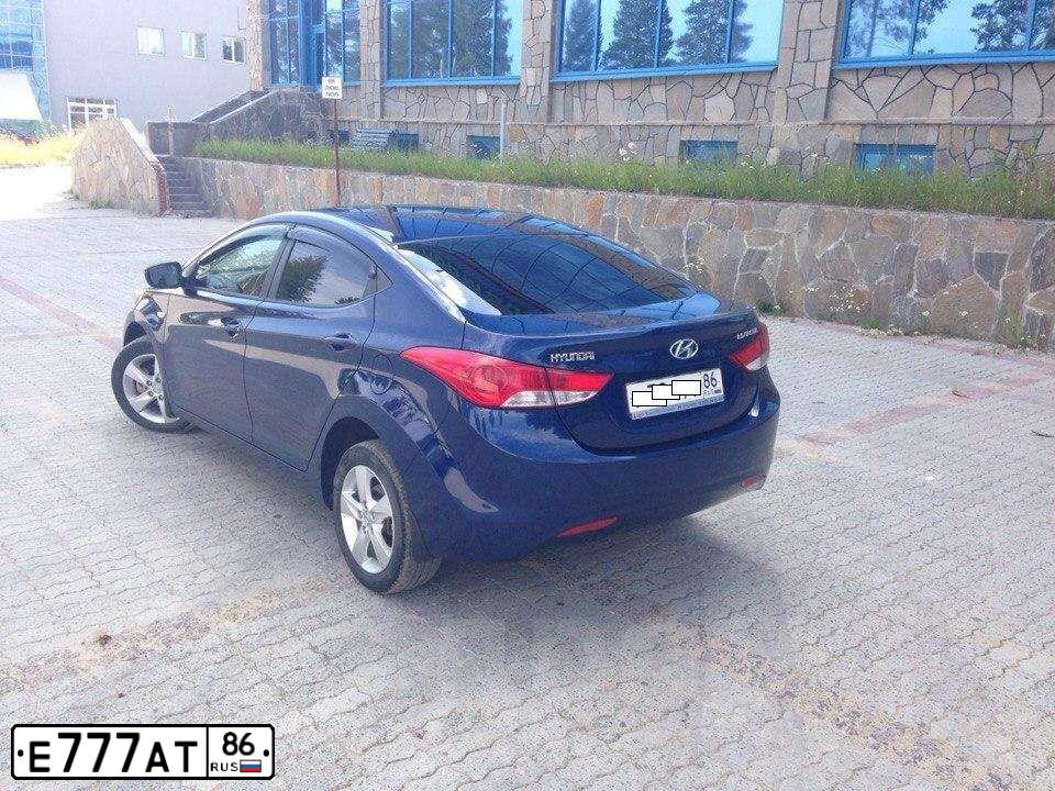 Фото автомобиля TOYOTA CAMRY, 2018 — госномер Е777АТ86. Цвет: БЕЛЫЙ ПЕРЛАМУТР