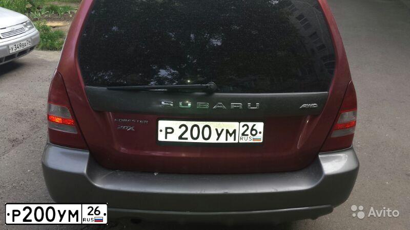 Фото автомобиля SUBARU FORESTER, 2004 — госномер Р200УМ26. Цвет: КРАСНЫЙ