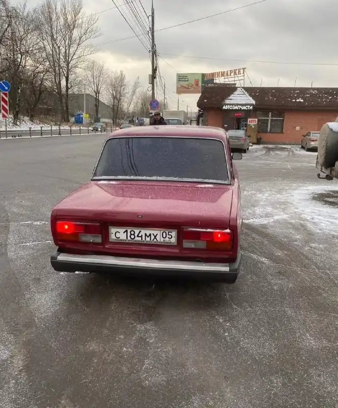 Фото автомобиля LADA 2107, 2003 — госномер С184МХ05. Цвет: ТЕМНО-ВИШНЕВЫЙ