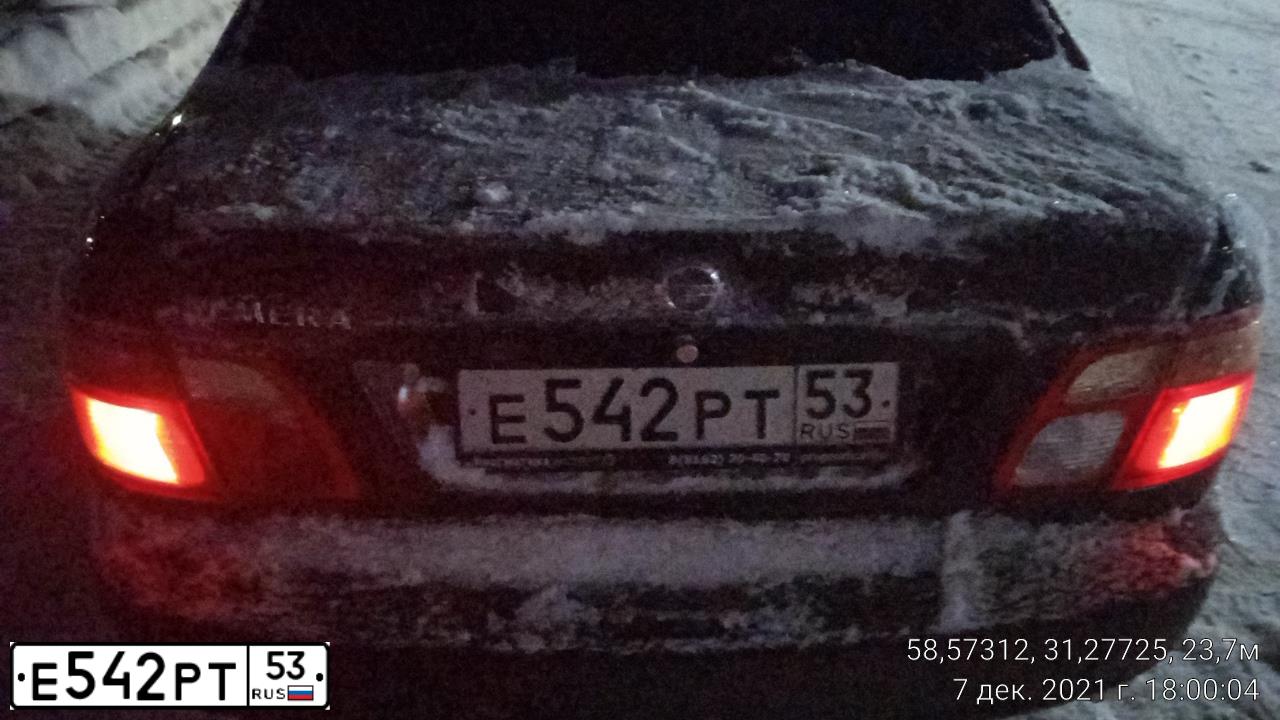 Фото автомобиля NISSAN ALMERA, 2005 — госномер К092МТ53. Цвет: ЧЕРНЫЙ