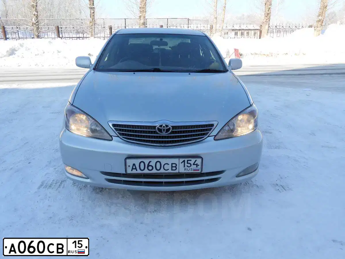Фото автомобиля LADA 2112, 2006 — госномер Н977ОА15